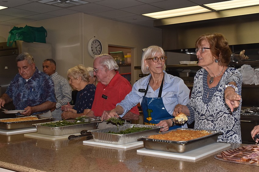 Church volunteers served up food in two fast-moving lines.