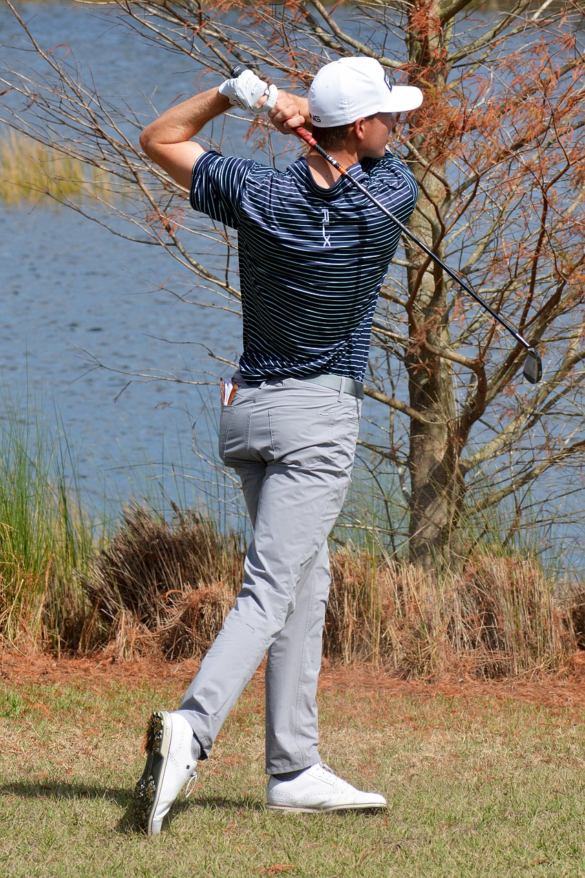 Trevor Werbylo hits his second shot from off the course on the No. 9 hole at Lakewood National Golf Club during the first round of the 2022 LECOM Suncoast Classic. Werbylo finished five under par.