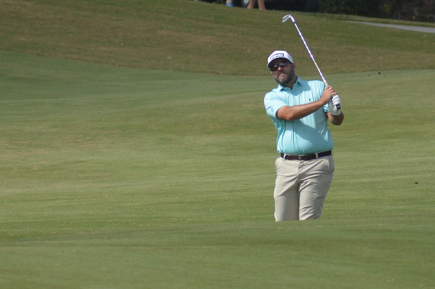 Brian Richey hits his second shot on the No. 9 hole at Lakewood National Golf Club during the first round of the 2022 LECOM Suncoast Classic. Richey finished five over par.