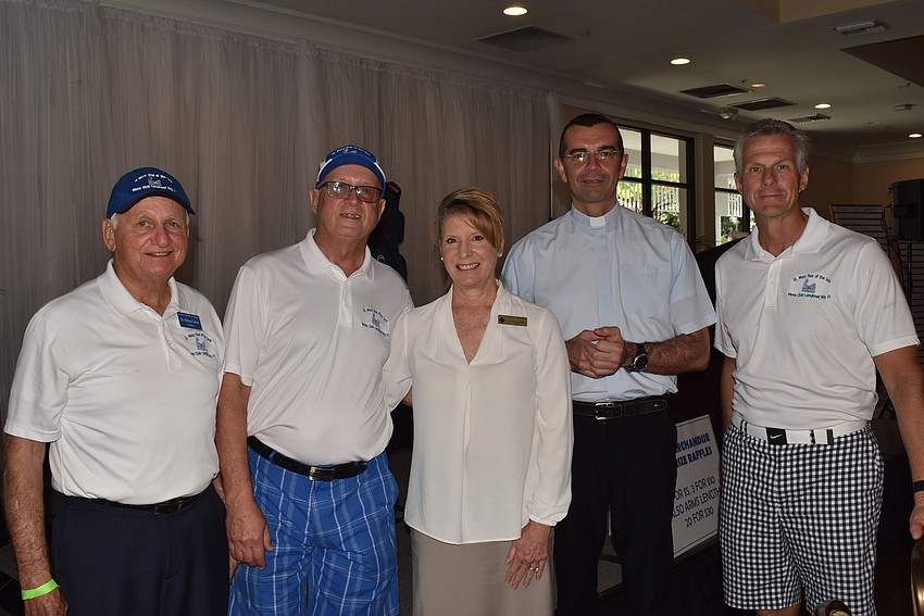 Chairman Mike Golia, club President Chuck Sobieck, St. Catherine Principal Christine Higgins, Rev. Robert Dziedziak and chairman Steve Golia