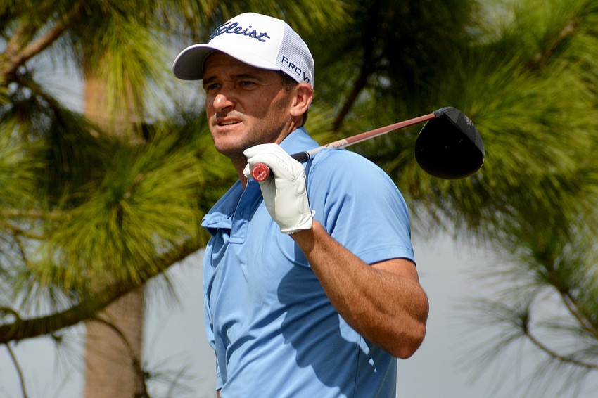 Sam Saunders grimaces after teeing off on the No. 1 hole on the second day of the 2022 LECOM Suncoast Classic, held at Lakewood National Golf Club.
