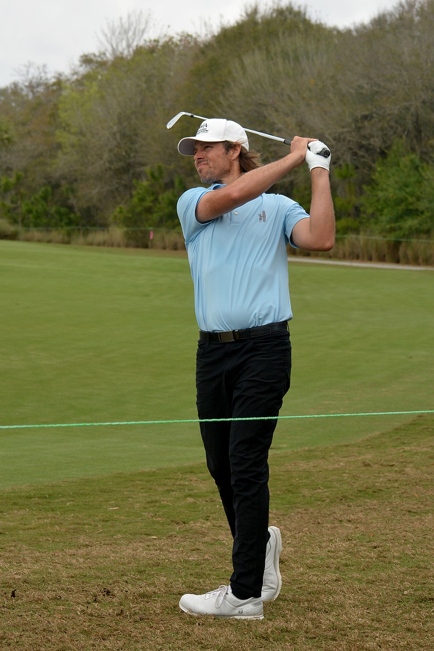 Aaron Baddeley hits his second shot on hole No. 1 on the second day of the 2022 LECOM Suncoast Classic, held at Lakewood National Golf Club.