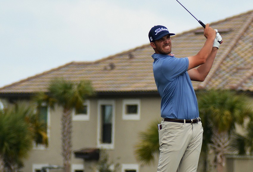 Your Observer Photo TeeK Kelly hits his second shot on the No. 18