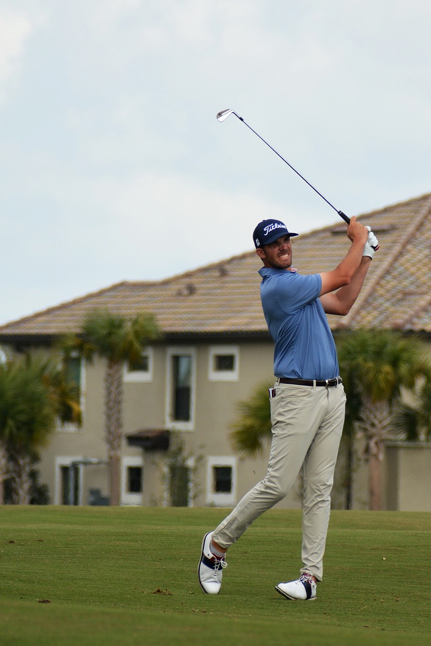 Tee-K Kelly hits his second shot on the No. 18 hole on the second day of the 2022 LECOM Suncoast Classic, held at Lakewood National Golf Club.