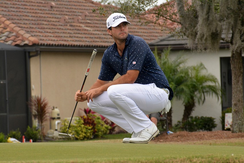 Jay Card III looks around before a putt on the No. 8 hole during round three of the 2022 LECOM Suncoast Classic at Lakewood National Golf Club.