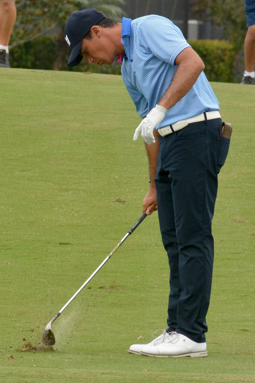 Martin Contini slams his club after hitting a shot on the No. 8 hole during round three of the 2022 LECOM Suncoast Classic at Lakewood National Golf Club.