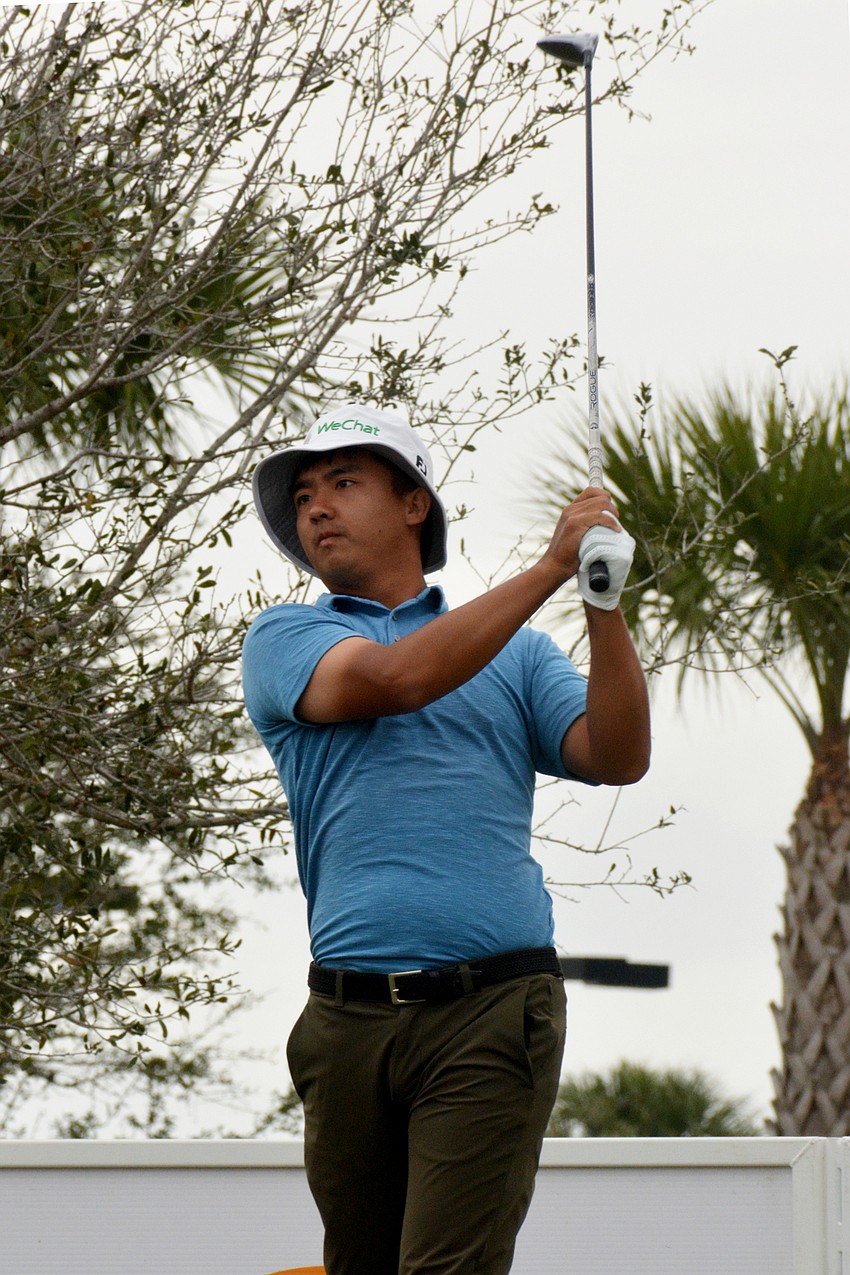 Zecheng Dou tees off on the No. 1 hole during round three of the 2022 LECOM Suncoast Classic at Lakewood National Golf Club.