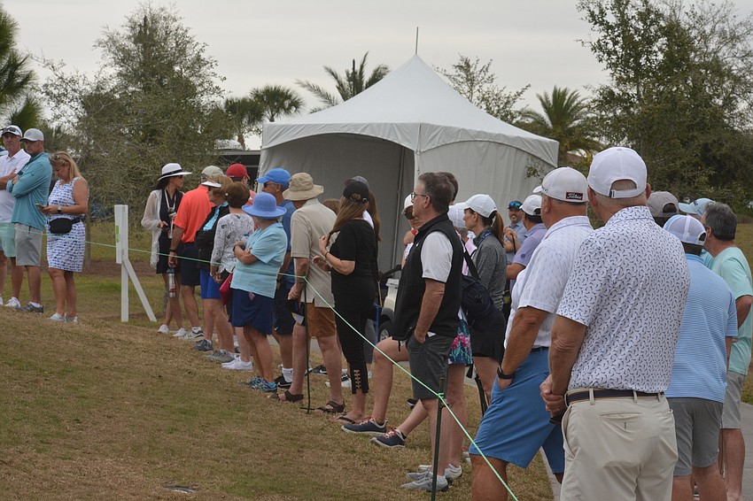 The crowd at round three of the 2022 LECOM Suncoast Classic at Lakewood National Golf Club wait for the leaders to begin their day.