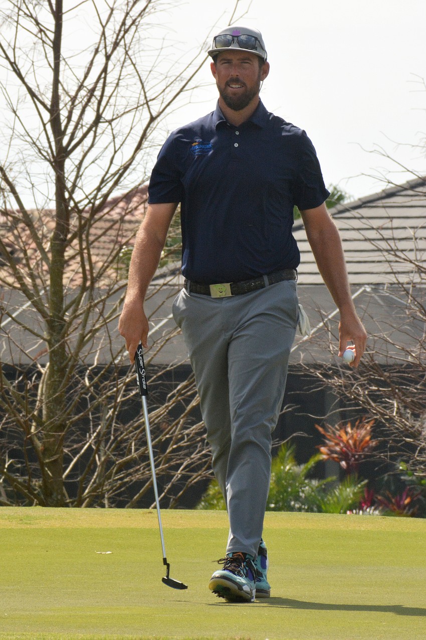 Brad Brunner walks off the green of the No. 8 hole during round three of the 2022 LECOM Suncoast Classic at Lakewood National Golf Club.