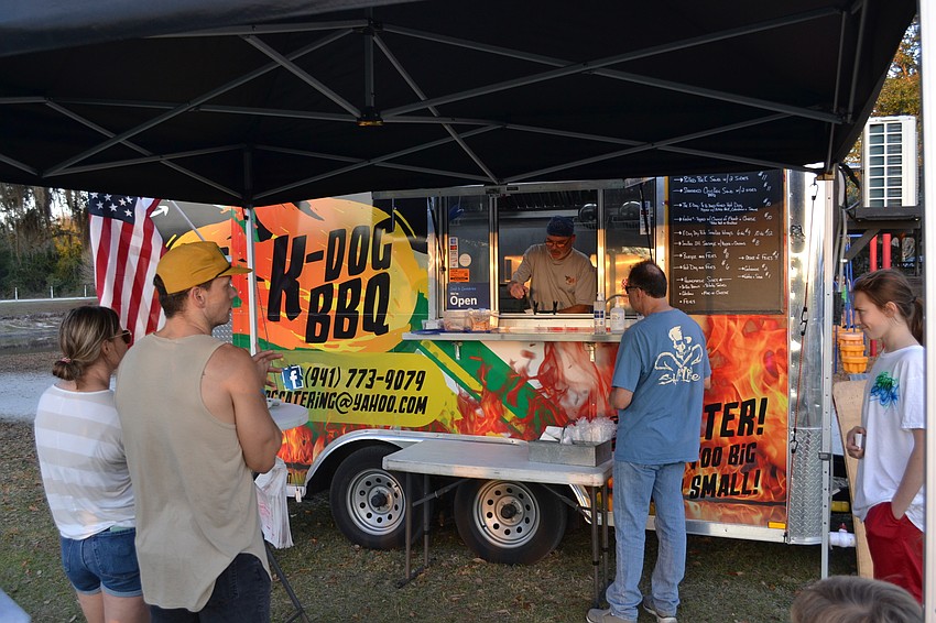 Kevin Harris of K-Dog BBQ supplies the barbecue for the campout.