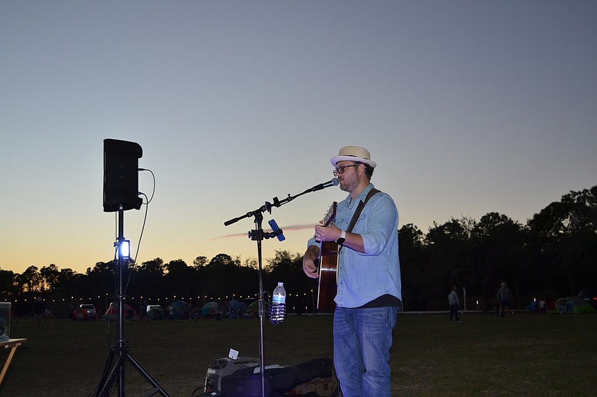 Justin Layman sets the ambience for the evening with his guitar.