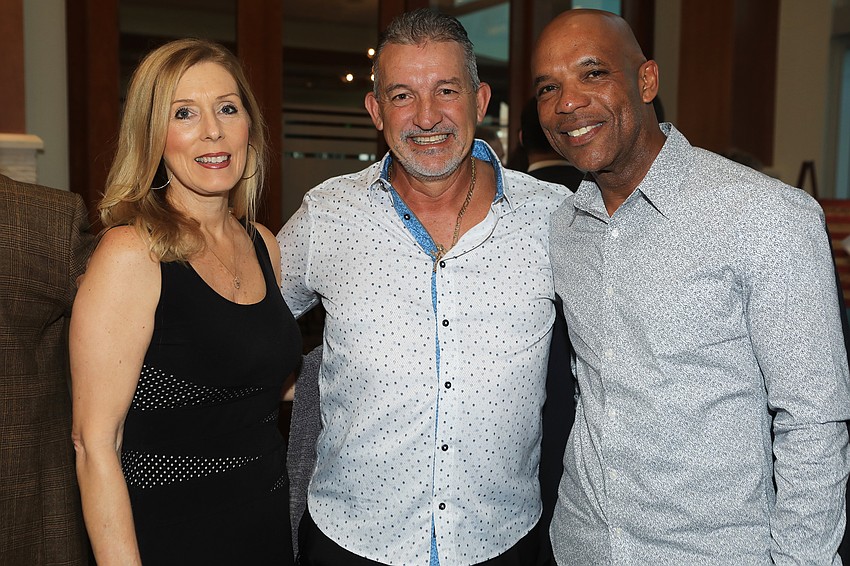 Kathi and Ken Castro with city manager Marlon Brown