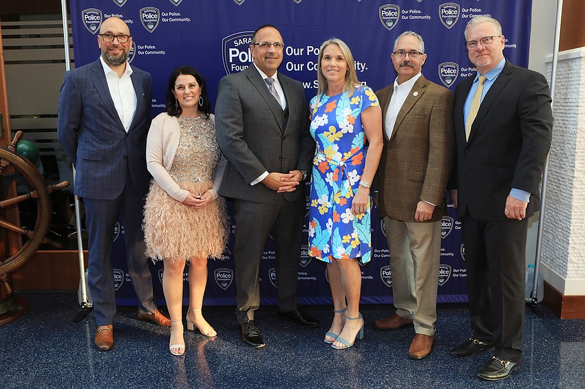 Board members Stephen Long, Areaka Jewell, Rex Troche,  Libby Soderberg, Jeff Birnbach and Sean Murphy