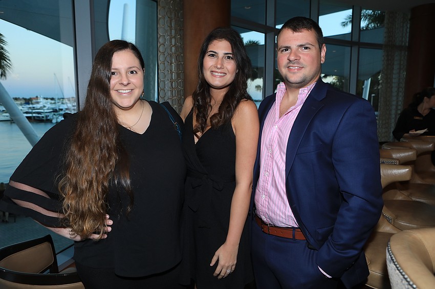 Officer of the Year Molly Spencer with Gabriella and George Terris