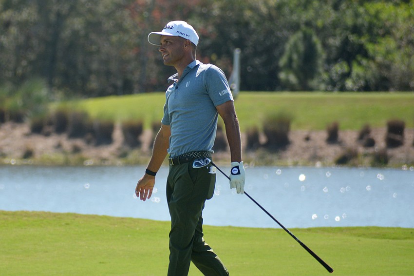 Eric Cole watches his second shot on the No. 9 hole during the final round of the 2022 LECOM Suncoast Classic at Lakewood National Golf Club.