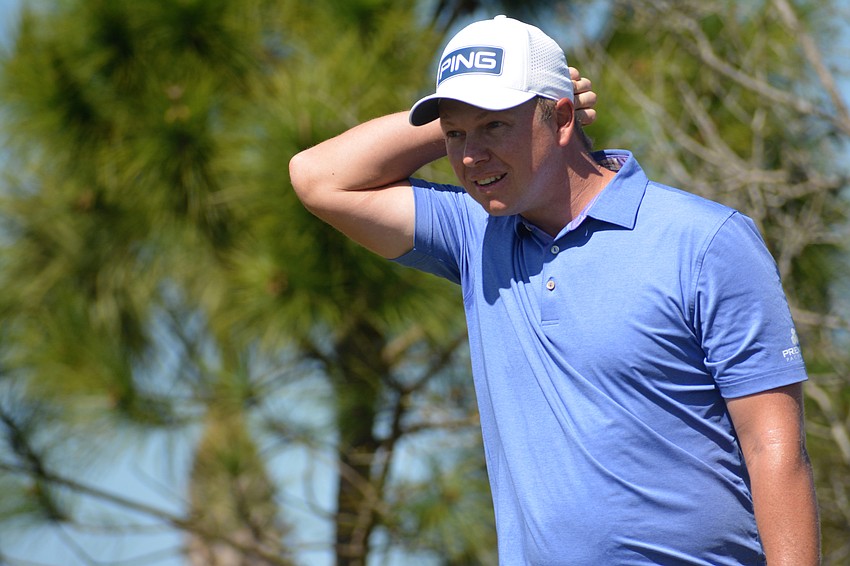 MJ Daffue scratches his head after his tee shot on the No. 1 hole during the final round of the 2022 LECOM Suncoast Classic at Lakewood National Golf Club.