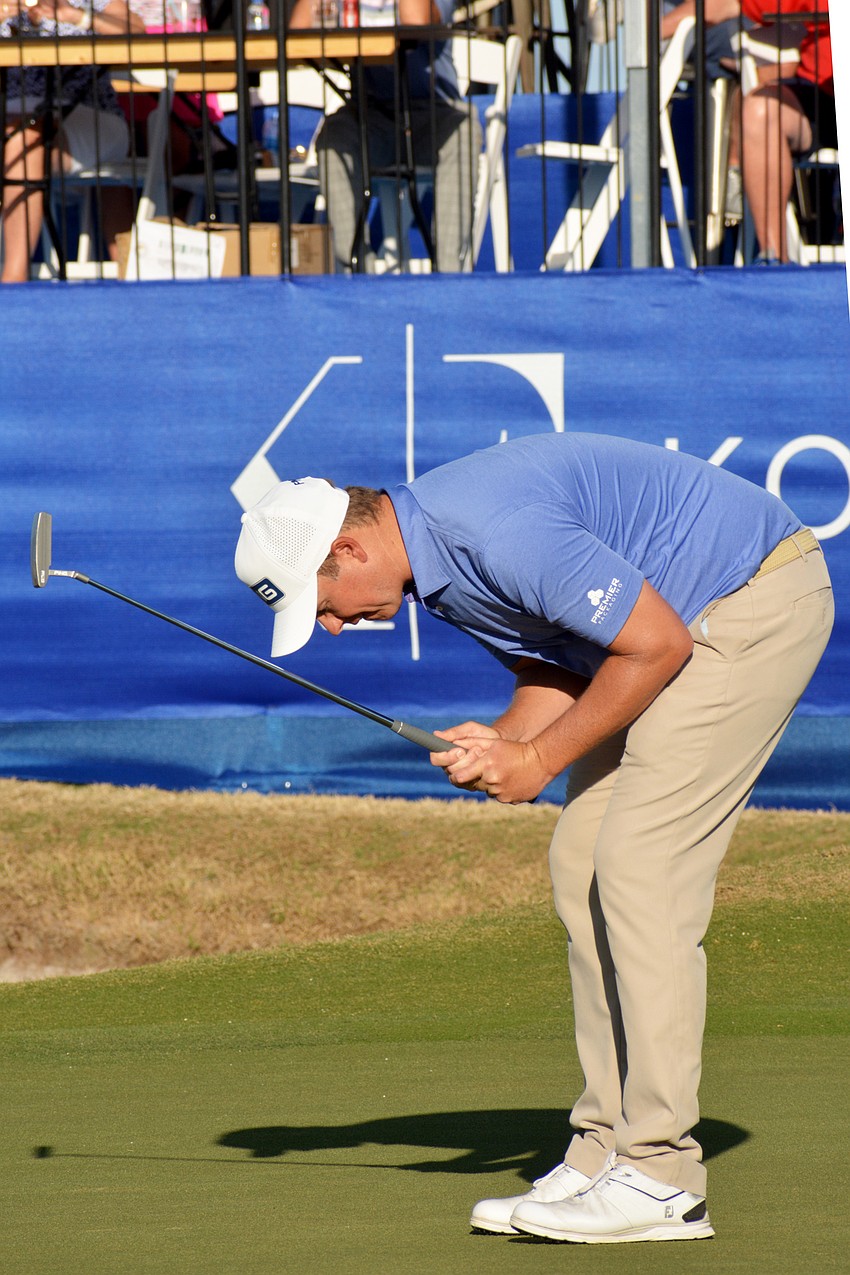 MJ Daffue bends over in heartbreak after missing a birdie putt on the No. 18 hole during the final round of the 2022 LECOM Suncoast Classic at Lakewood National Golf Club. The putt would have forced a playoff with Byeong Hun An.