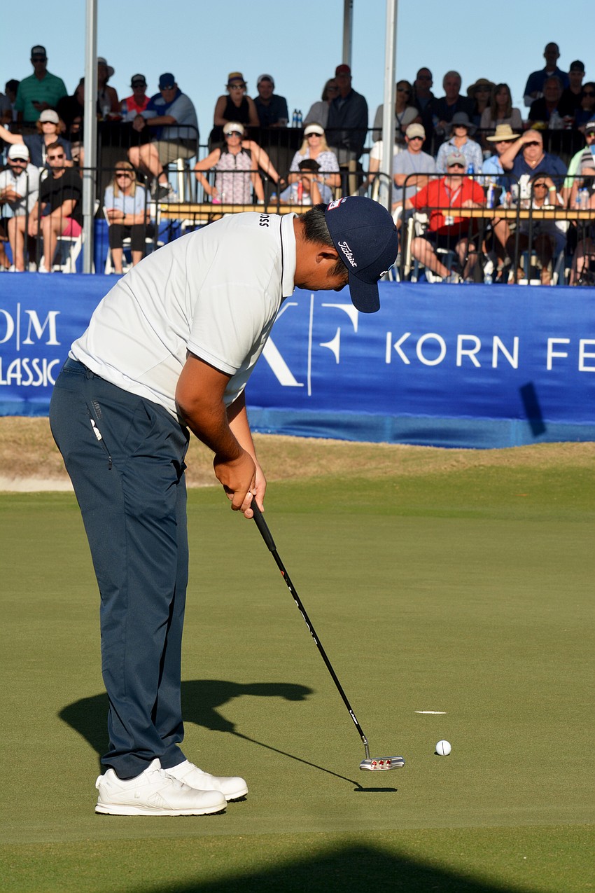 Byeong Hun An putts for par on the No. 18 hole during the final round of the 2022 LECOM Suncoast Classic. The putt would give An a solo lead entering the clubhouse. An missed the putt but was later crowned champion.
