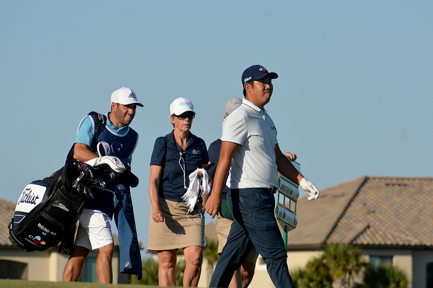 Byeong Hun An walks the No. 18 hole during the final round of the 2022 LECOM Suncoast Classic at Lakewood National Golf Club.