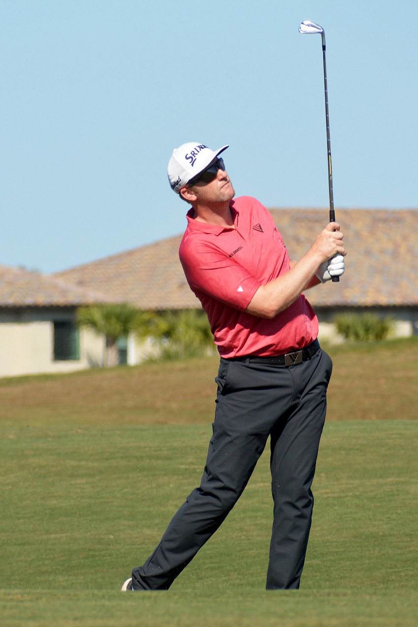 Ryan Brehm hits his second shot on the No. 18 hole during the final round of the 2022 LECOM Suncoast Classic at Lakewood National Golf Club.