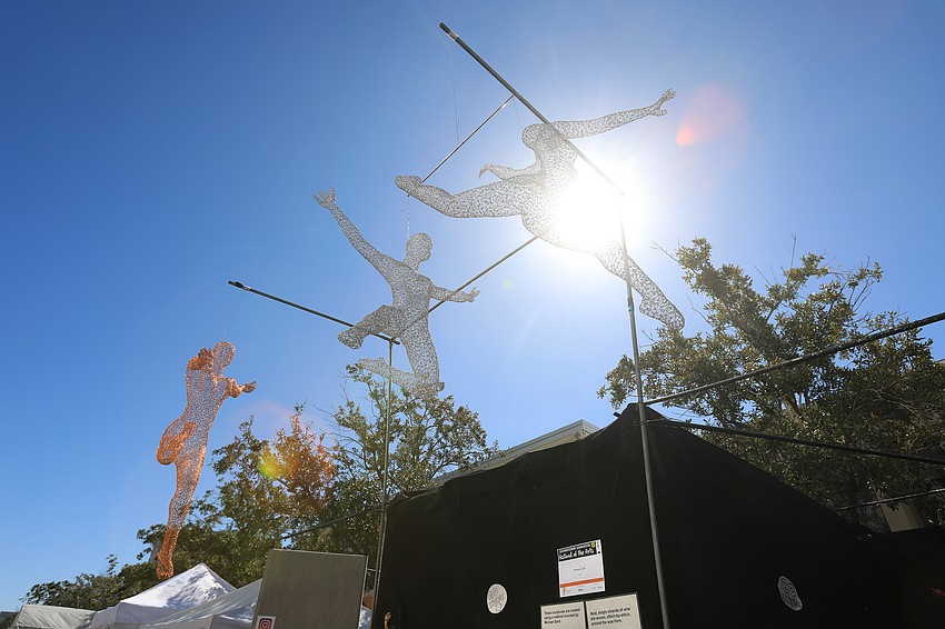 Michael Gard brought humanoid sculptures that hung overhead.