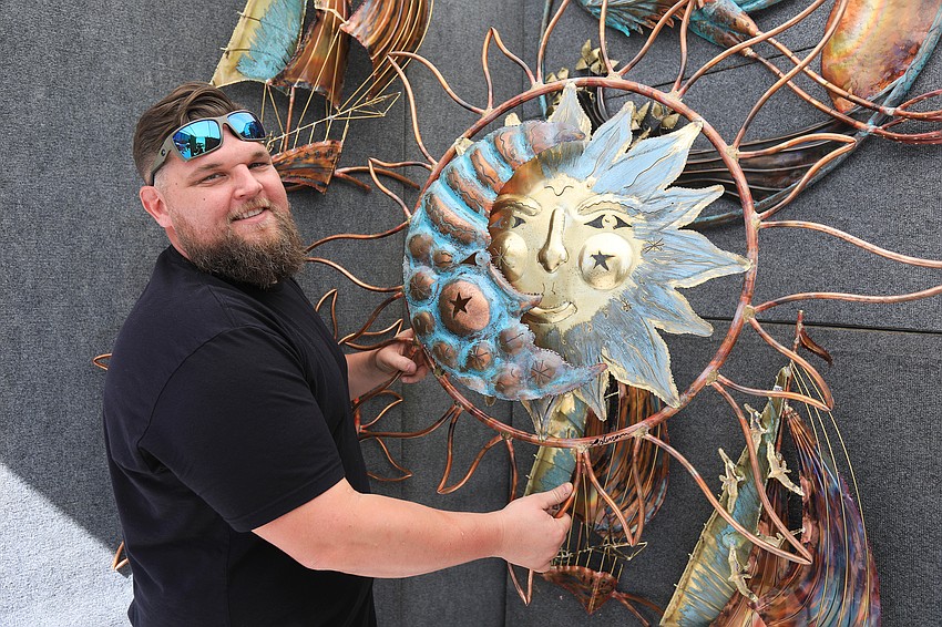 Chad Anderson showed off one of his copper and brass designs.