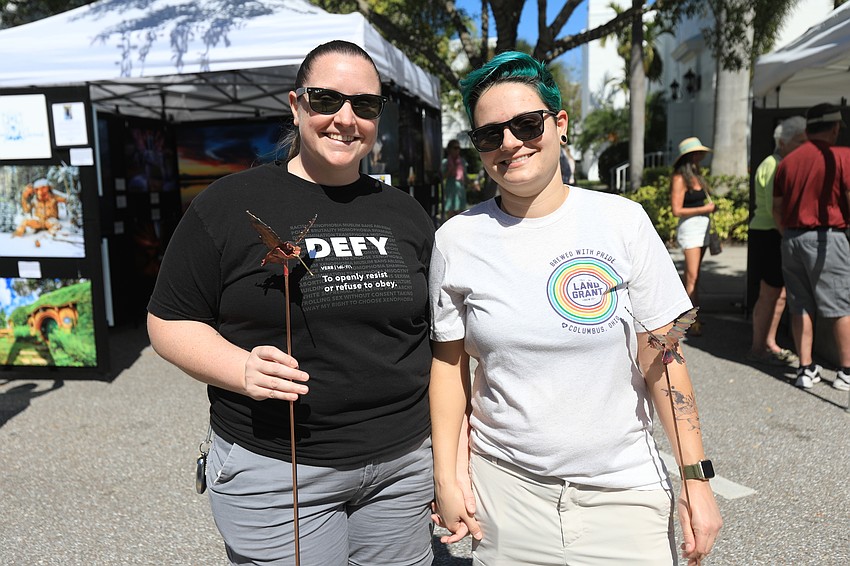 Kelly Thibert and Asia Amato bought matching hummingbird sculptures.