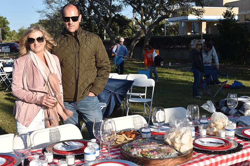 Kristin and Christiaan Fourie helped set up shop at the WrightWay table.