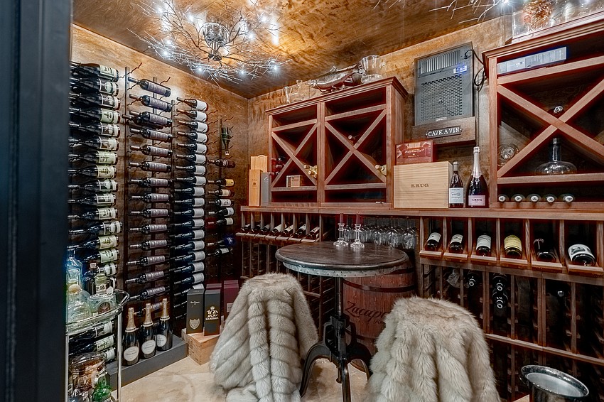 The climate-controlled wine cellar can store more than 400 bottles.