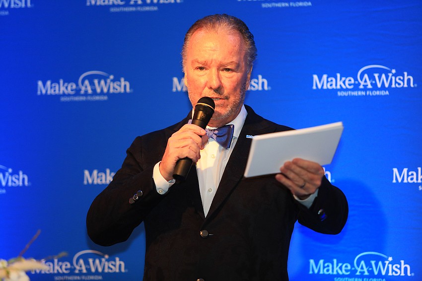 Michael Klauber emcees the dinner.