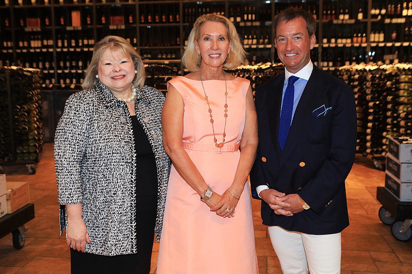 Debbi Benedict. chairwoman Pamela Reilly and guest speaker Alex Hitz