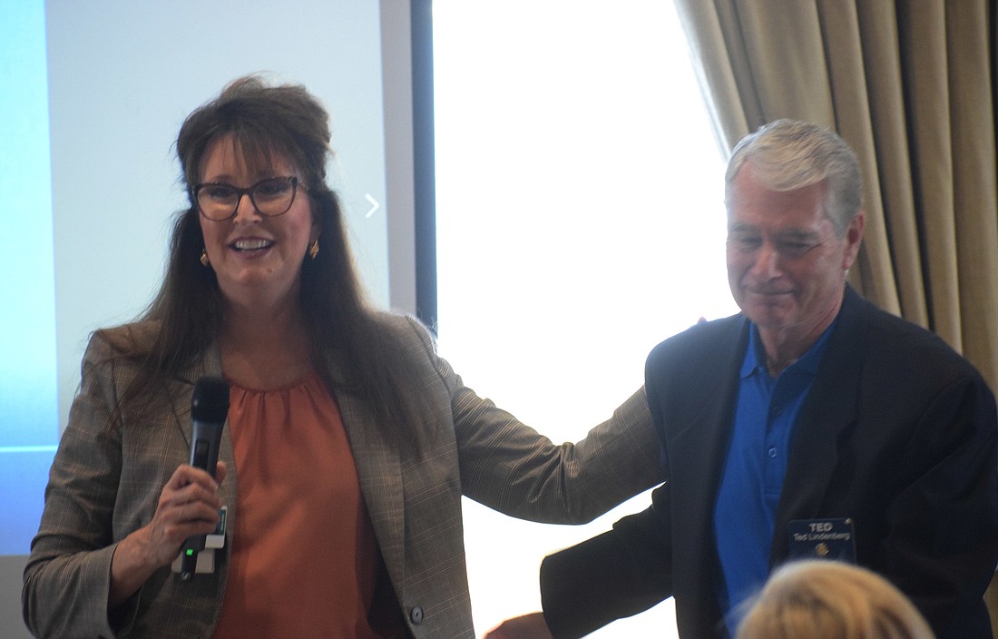 Cynthia Saunders, the superintendent of the School District of Manatee County, thanks Ted Lindenberg, the director of the Books for Kids program, for all he&#39;s done to support Manatee County students.