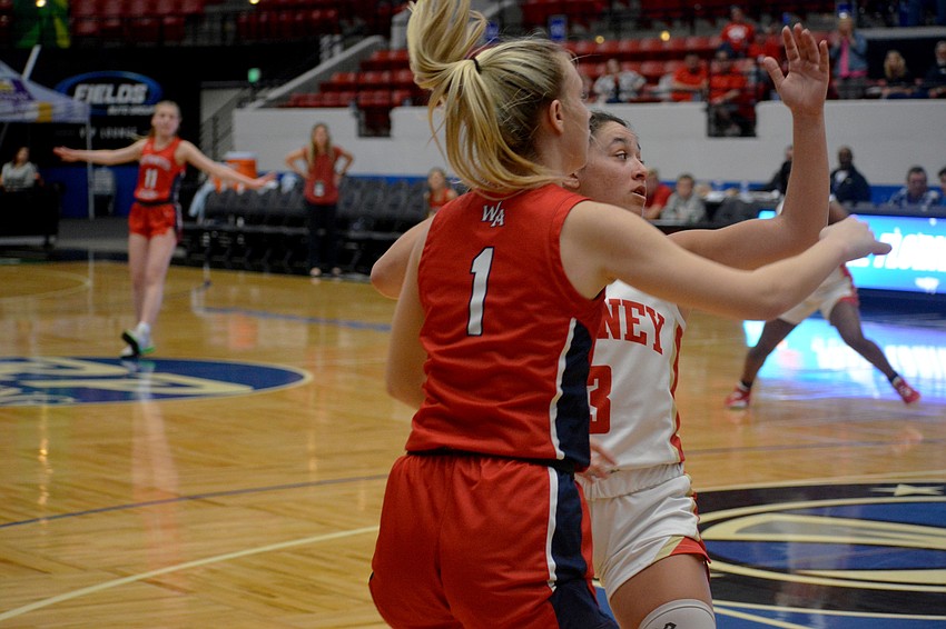 Mooney senior Natalie Mercadante (3) guards Westminster senior Claire Erickson (1).