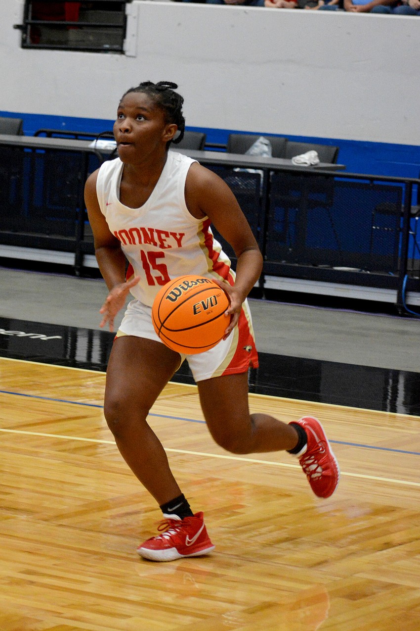 Mooney freshman Sy'monique Simon drives to the basket against Westminster Academy.