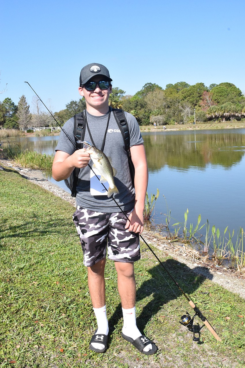 Lakewood Ranch's Aiden Piccirilli, who is 15, catches a 11-inch fish. Piccirilli went on to catch another fish less than 5 minutes later.