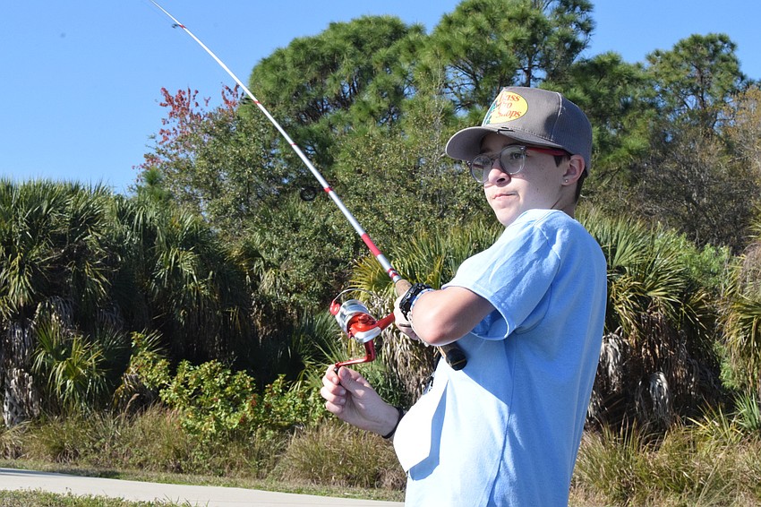 Lakewood Ranch's Cassidy Barnhardt, who is 12, almost catches a fish, but it escapes her hook.