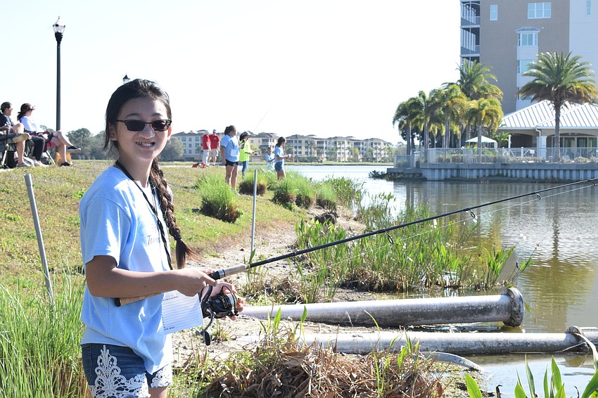 Sarasota's Dakota Warth, who is 12, has fun while fishing.