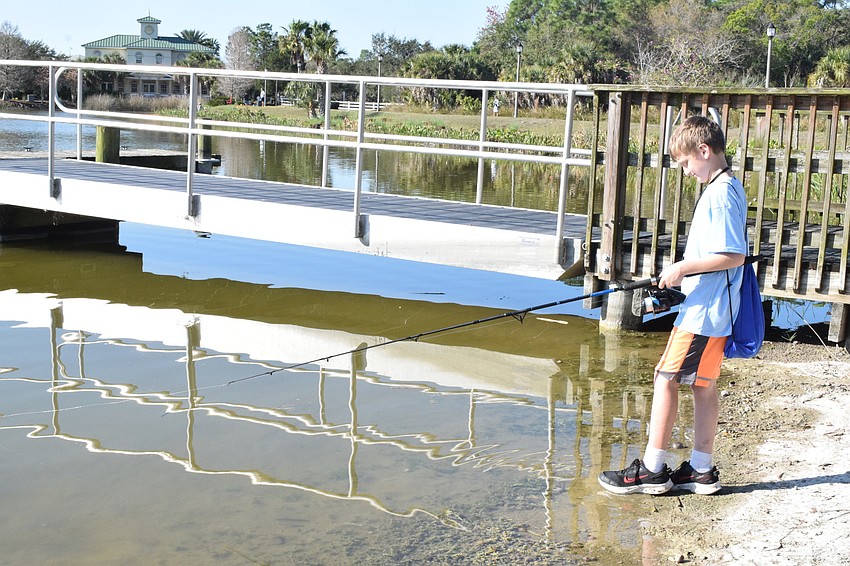Sarasota's Jonathan Porak, who is 11, patiently waits to see if he catches a fish.