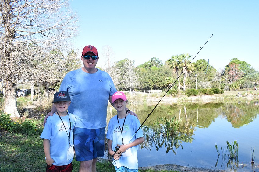 Lakewood Ranch's Grayson Eaton, who is 6 years old, is excited to fish with his father, Sean Eaton, and 9-year-old sister, Kaelee Eaton.