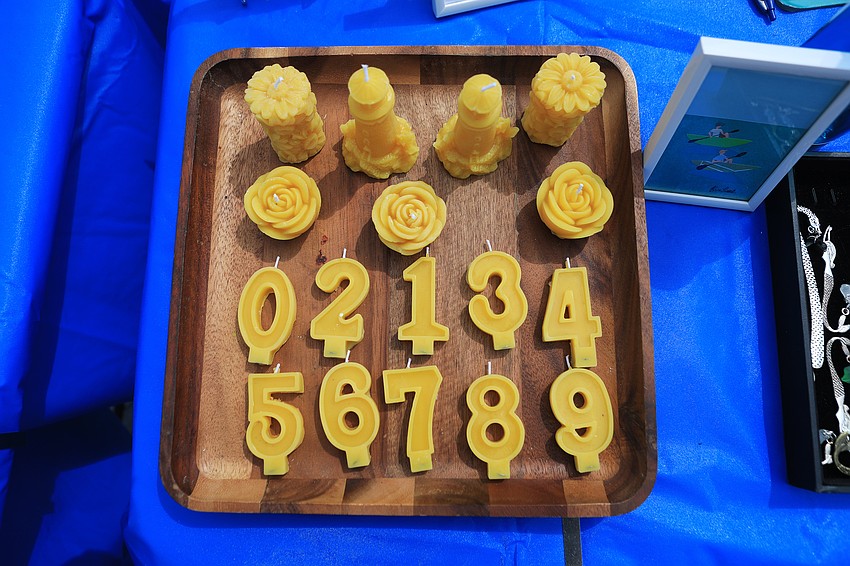 Xavier Picard sells beeswax candles.