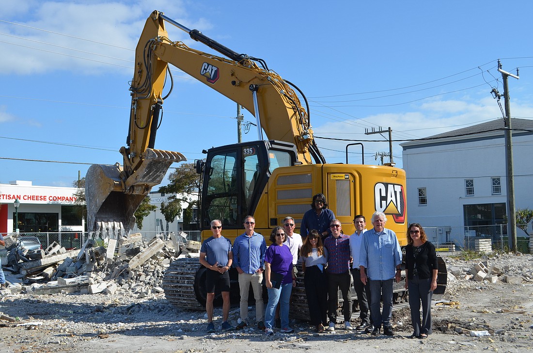 Rosemary District Association members posing for a photo after demolition began last Wednesday to make way for a new park.