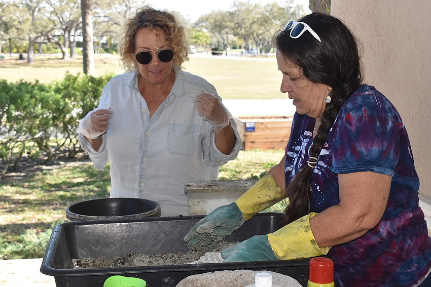 Sandi Love prepares to dive into mixing with Deb Lemieux.