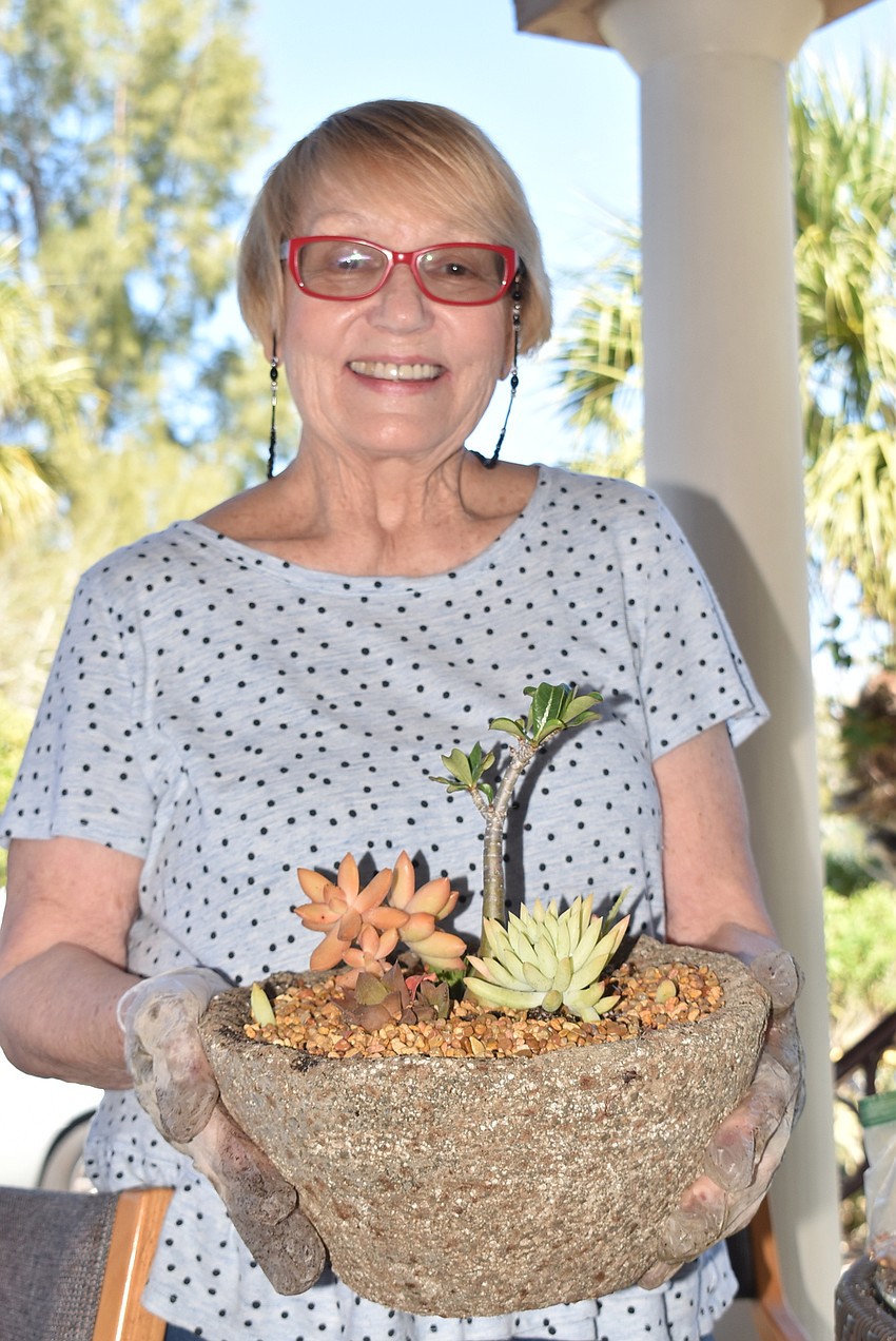 Marcia Gregg shows off her finished product.