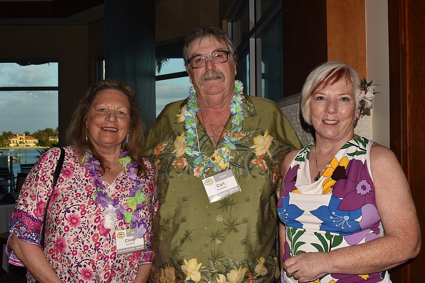 Cindy Shoffstall and Lido Key Residents Association President Carl Shoffstall with Julie Bales.