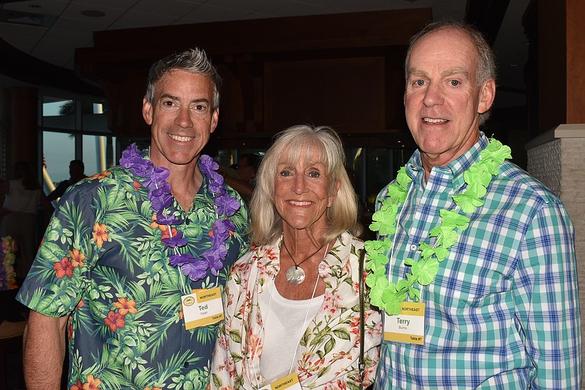 Ted Gage, Carol Burris and Terry Burris caught up after the winter.
