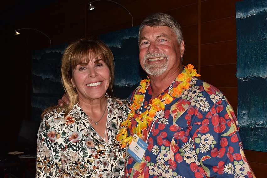 Cynthia Mattis and Jim Johnson caught up in the lobby before dinner.