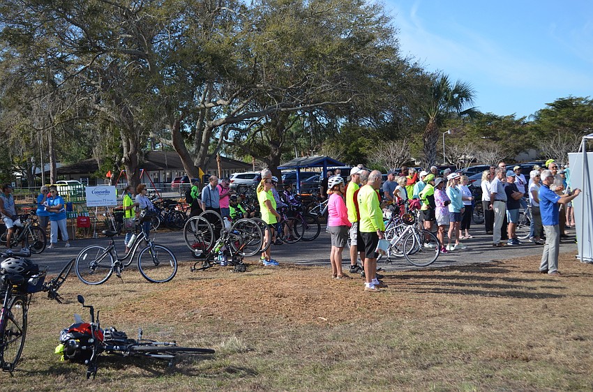 A crowd listens to county staff ahead of the opening of Legacy Trail's Segment 3 at Payne Park.