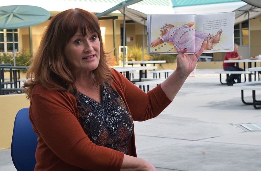 Kathy Kersey, a STEM teacher, reads 