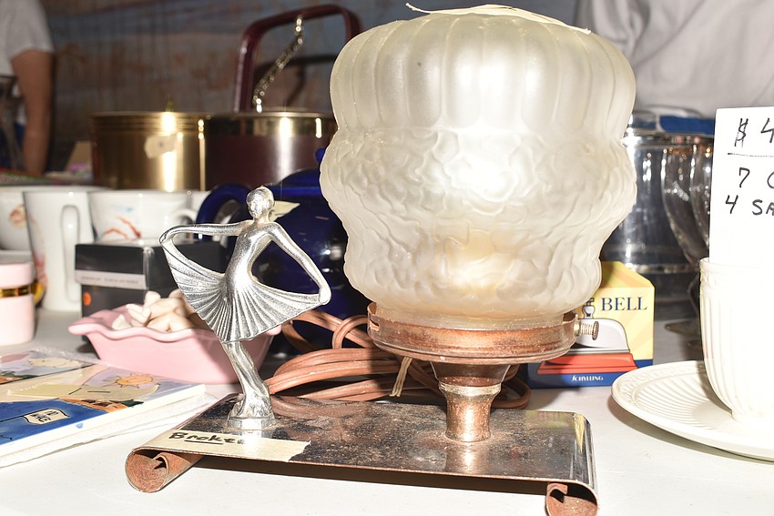 A broken art deco lamp was purchased by an electrician.