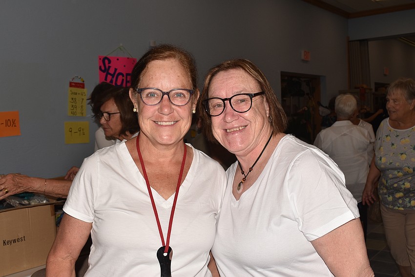 Sisters Beth Clark and Laura Kem work in the shoe department.